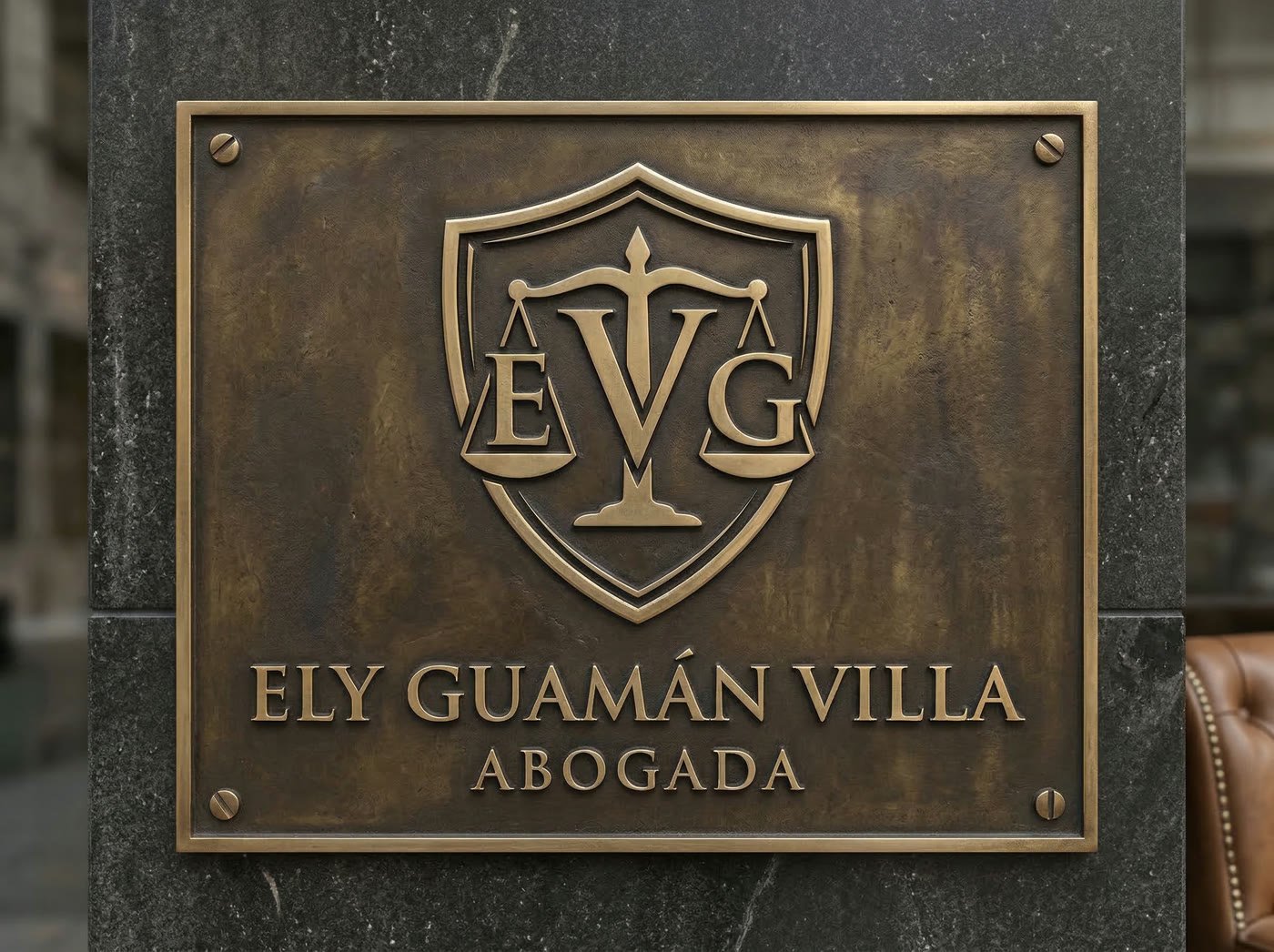 Placa de bronce con la marca Ely Guamán Villa